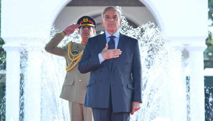 Prime Minister Shehbaz Sharif receives a guard of honour at PM House on April 12, 2022. — PID