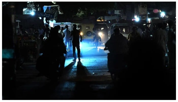 An area in Pakistan drowned in darkness due to power outage. — AFP/ file