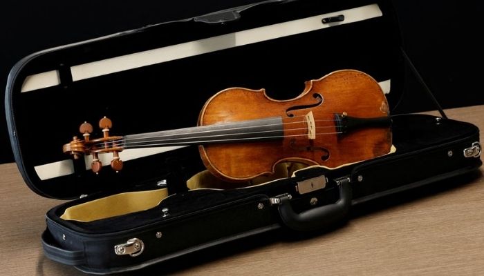 A rare 1736 violin by Italian luthier Guarneri del Gesu is displayed during a media preview at Aguttes auction house ahead of the violins auction in Neuilly-sur-Seine, near Paris, France, April 26, 2022. Picture taken April 26, 2022.— Reuters