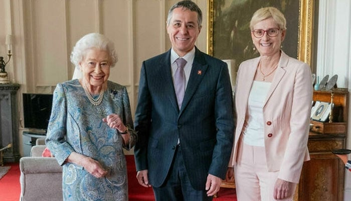 Queen looks fit and happy as she meets with Switzerlands president and his wife at Windsor