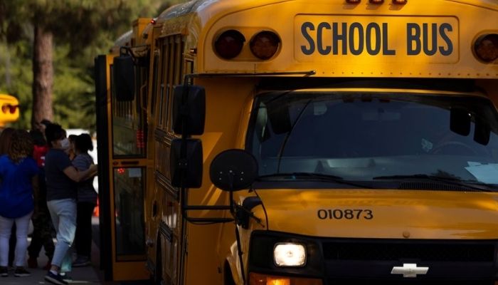 School buses line up outside Woodrow Wilson Senior High School as students return to in-person classes in Los Angeles, California, U.S., August 30, 2021.— Reuters