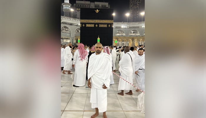 Pakistans all-format cricket skipper Babar Azam poses while standing at the Grand Mosque in Makkah, Saudi Arabia, on April 30, 2022. — Twitter/babarazam258