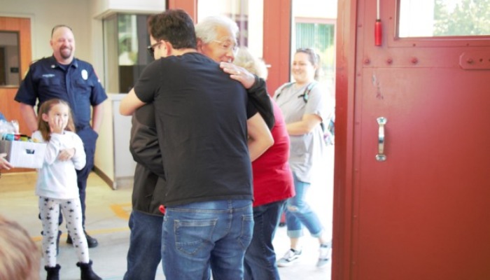 Bilal Shahid hugging the 72-year-old man. — Facebook/ Livermore Police Department