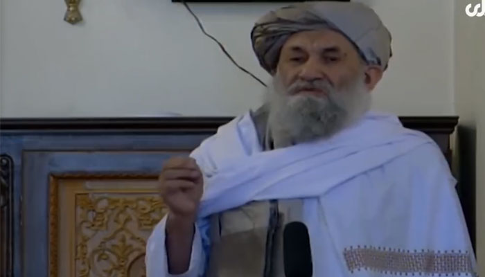 Afghanistan interim prime minister Mullah Mohammad Hassan Akhund addressing the Eid prayers at a mosque in Kabul. — Screengrab Tolo News