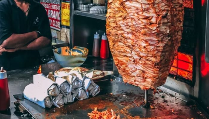 16-year-old girl dies after eating Shawarma.—Unsplash/YashBhardwaj