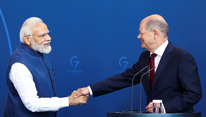 German Chancellor Olaf Scholz and Indian Prime Minister Narendra Modi shake hands as they attend a news conference during the German-Indian government consultations at the Chancellery in Berlin, Germany May 2, 2022. — Reuters