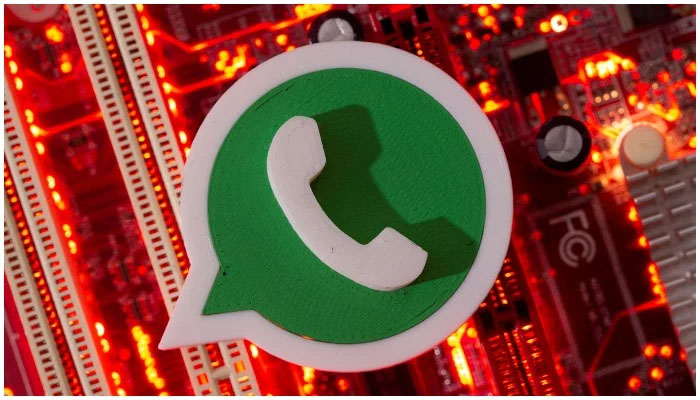 A 3D printed Whatsapp logo is placed on a computer motherboard in this illustration taken January 21, 2021. Photo: Reuters/ file