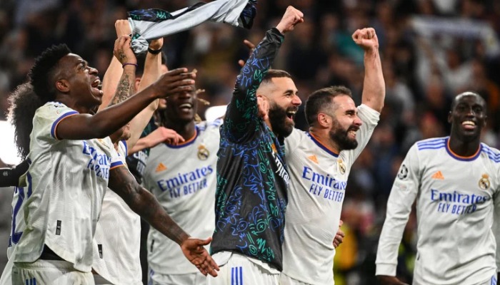 Real Madrid players celebrate their victory at the end of yesterday’s (May 4) match against Manchester City. — AFP/File