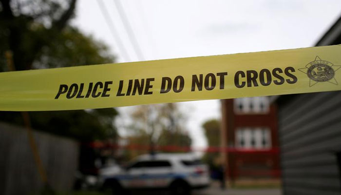 Yellow police tape is displayed at a crime scene after a motorist was shot in the head along the 2700 block of south 80th Street in Chicago, Illinois, US, November 1, 2017. — Reuters/File