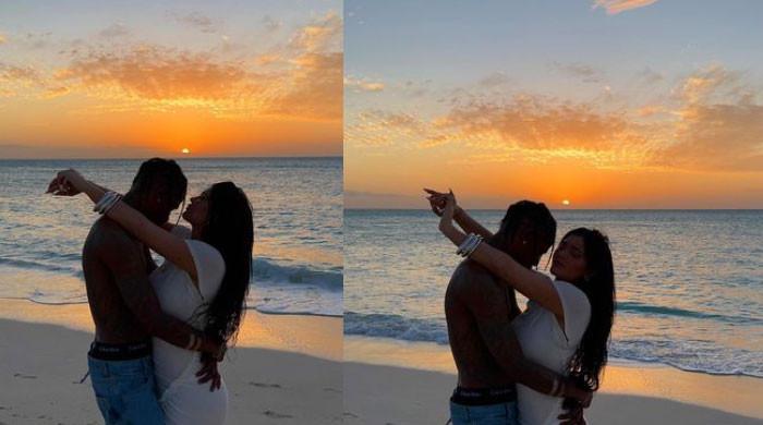 Kylie Jenner poses with shirtless Travis Scott in scene-stealing sunset ...
