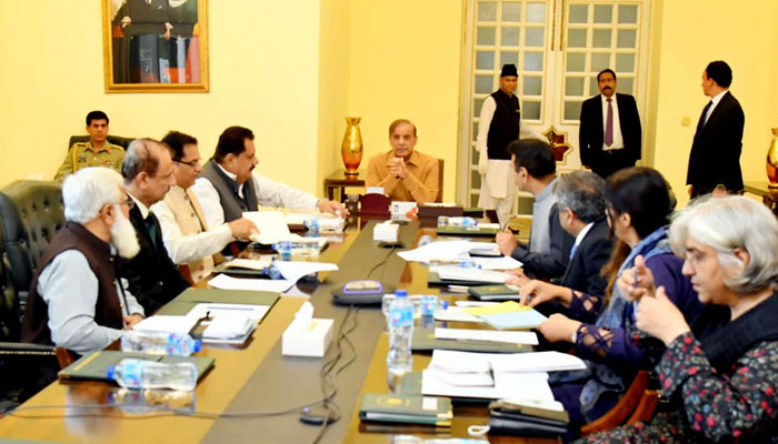 PM Shehbaz Sharif chairs a high-level meeting in Islamabad, regarding wheat production, existing reserves, and its consumption at the provincial and the national level. — PID