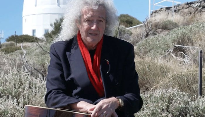In Spanish debut, Brian May sings about Another World