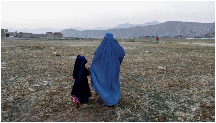 An Afghan woman clad in burqa walks in the early morning in Kabul, Afghanistan September 2, 2019.REUTERS/Mohammad Ismail