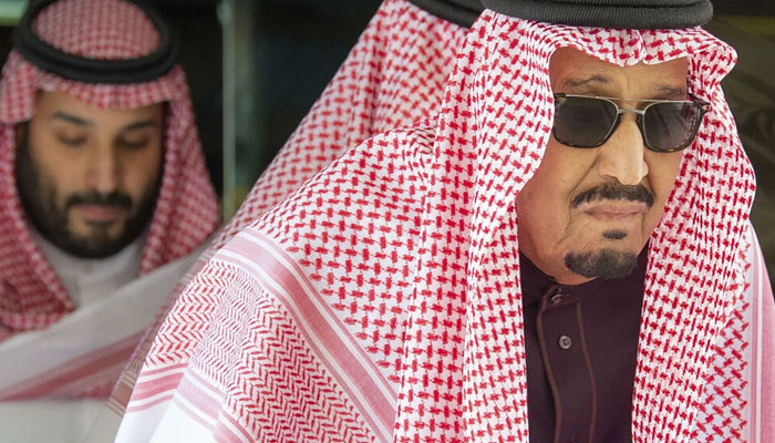 Saudi Arabias King Salman Abdulaziz (R), accompanied by Crown Prince Mohammed bin Salman (L), on March 16, 2022. Photo: AFP