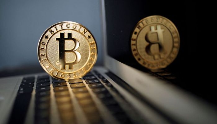 A bitcoin representation is seen in an illustration picture taken at La Maison du Bitcoin in Paris, France, on June 23, 2017.—Reuters