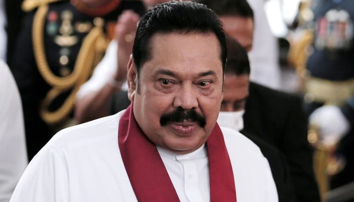Sri Lankas Prime Minister Mahinda Rajapaksa reacts during his swearing-in ceremony as the new Prime Minister, at Kelaniya Buddhist temple in Colombo, Sri Lanka, August 9, 2020. — Reuters