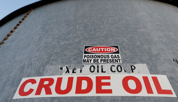 A sticker reads crude oil on the side of a storage tank in the Permian Basin in Mentone, Loving County, Texas, US November 22, 2019. Picture taken November 22, 2019. — Reuters/File