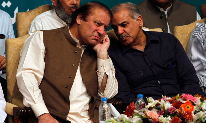 PML-N supremo Nawaz Sharif (L) and Prime Minister Shehbaz Sharif. — Reuters/File