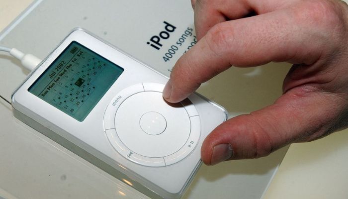An updated version of Apple's popular iPod MP3 player at the Macworld Conference and Expo in New York on July 17, 2002.—Reuters