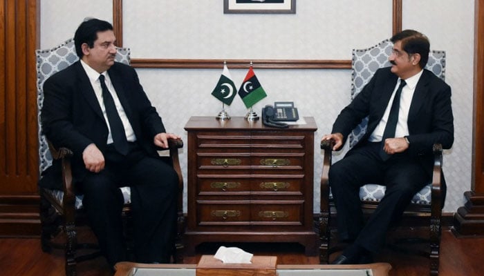 Federal Minister for Power Khurram Dastagir (L) holds a meeting with Chief Minister Sindh Murad Ali Shah at CM House on May 12, 2022. Twitter/SindhCMHouse