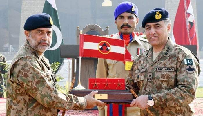 Lieutenant General Nauman Mahmood handing over the command of Peshawar Corps to Lieutenant General Faiz Hameed.  - ISPR
