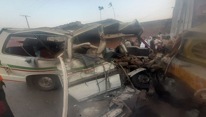 Picture of van collided with dumper. Photo—Dunya News