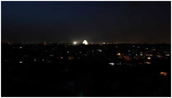 Karachi neighbourhoods seen submerged in darkness during a power breakdown. — Reuters/File