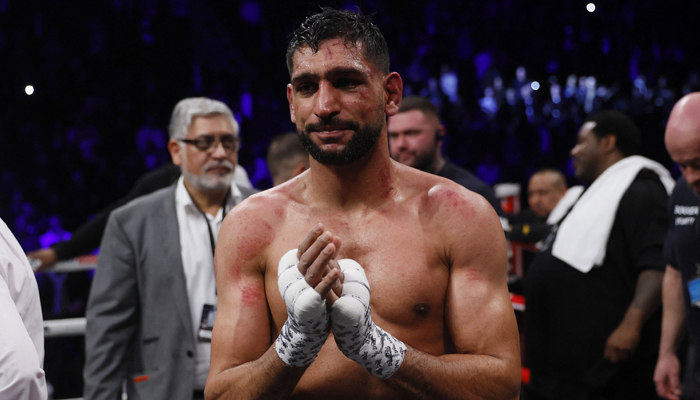 Boxing - Amir Khan v Kell Brook - AO Arena, Manchester, Britain - February 19, 2022, Amir Khan gestures after a fight. — Reuters