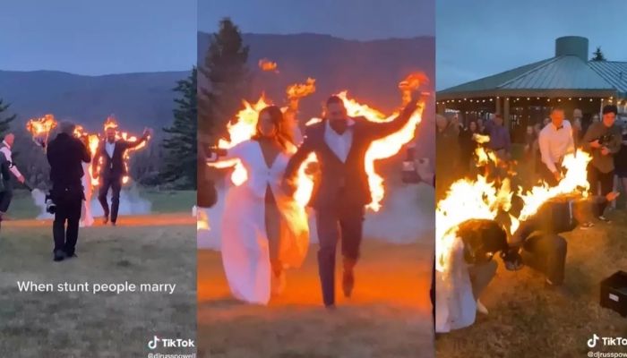 Newlywed couple performs an outrageous stunt in which they light themselves on fire.—Screengrab via Instagram/@djrusspowell