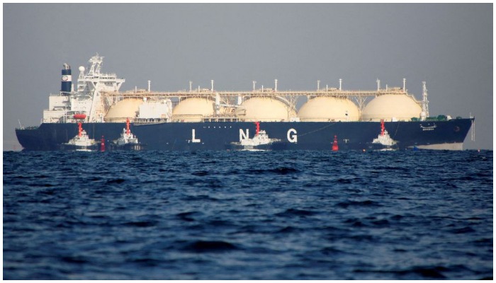 A liquefied natural gas (LNG) tanker is tugged towards a thermal power station in Futtsu, east of Tokyo, Japan November 13, 2017. — Reuters/Issei Kato