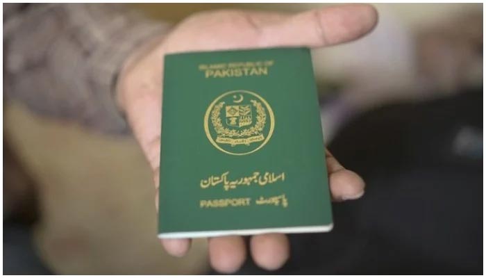 A person holding a Pakistani passport. — AFP