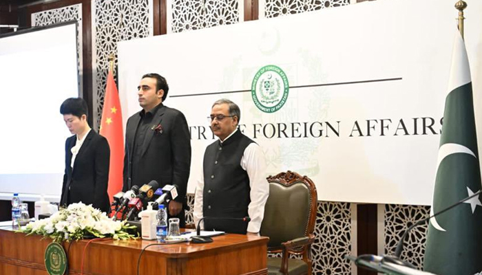 Foreign Minister Bilawal Bhutto-Zardari (centre) stands in respect during a condolence reference held at the Ministry of Foreign Affairs for the slain Chinese teachers in Islamabad, on May 14, 2022. — Twitter/PPP