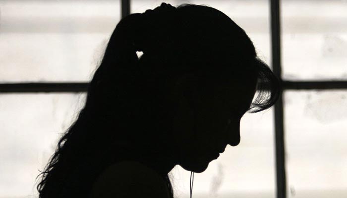 The picture shows a silhouette of a girl. — Reuters/File