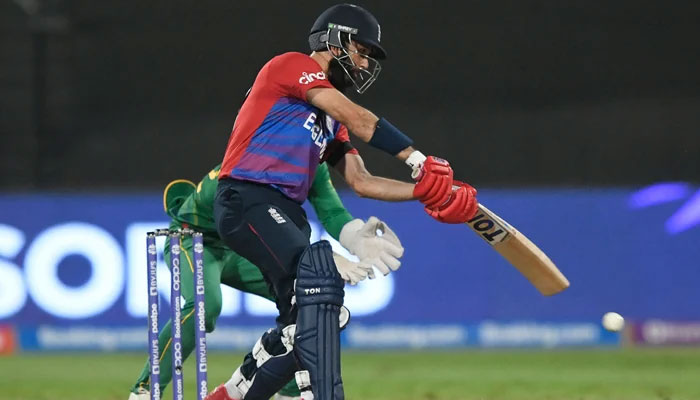 England´s Moeen Ali plays a shot during the ICC Twenty20 World Cup cricket match between England and South Africa at the Sharjah Cricket Stadium in Sharjah on November 6, 2021. — AFP