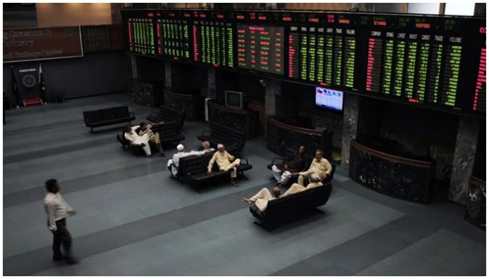 Investors sitting in the main hall of the Pakistan Stock Exchange in Karachi — AFP/File