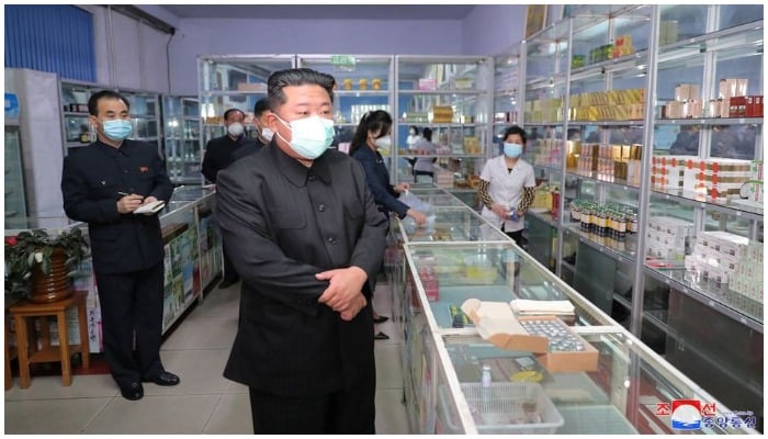 North Korean leader Kim Jong Un wears a face mask amid the coronavirus disease (COVID-19) outbreak, while inspecting a pharmacy in Pyongyang, in this undated photo released by North Koreas Korean Central News Agency (KCNA) on May 15, 2022. — Reuters