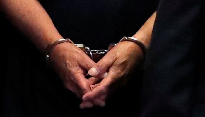 Former Trump campaign chairman Paul Manaforts hands are shown in handcuffs as he is escorted into court during before his arraignment in New York Supreme Court in New York, U.S., June 27, 2019.—Reuters