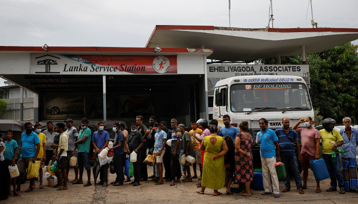 People wait in a queue to buy petrol at a fuel station, amid the countrys economic crisis in Colombo, Sri Lanka, May 16, 2022. — Reuters