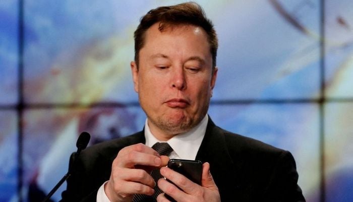 Elon Musk looks at his mobile phone in Cape Canaveral, Florida, U.S. January 19, 2020. — Reuters/File