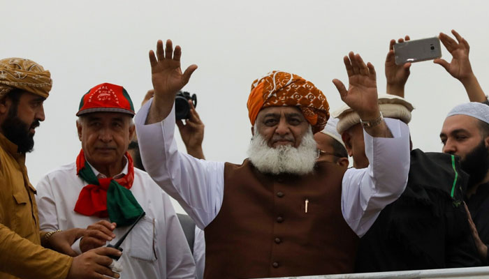 Fazal-ur Rehman, president of the JUI-F waves to supporters during what participants call Azadi March (Freedom March) to protest the government of Prime Minister Imran Khan, in Islamabad, Nov. 1, 2019. — Reuters/File