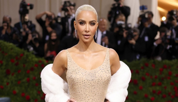 Kim Kardashian’s Sports Illustrated Swimsuit cover photo sparks debate online