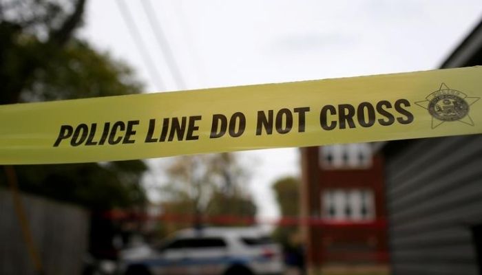 Yellow police tape is displayed at a crime scene after a motorist was shot in the head along the 2700 block of south 80th Street in Chicago, Illinois, U.S., November 1, 201. — Reuters/File