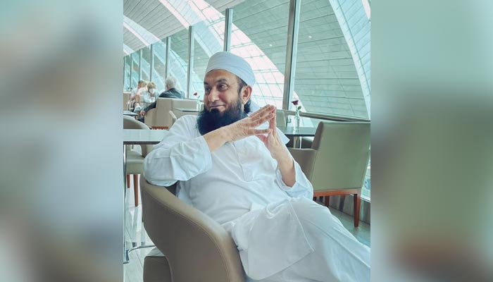 Renowned religious scholar Maulana Tariq Jameel gestures at the Dubai International Airport & City Guide in this undated photo. — Instagram/tariqjamilofficial