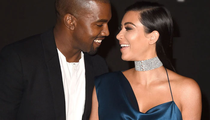 Kim Kardashian defends Kanye West as he drops their kids at school in fire truck