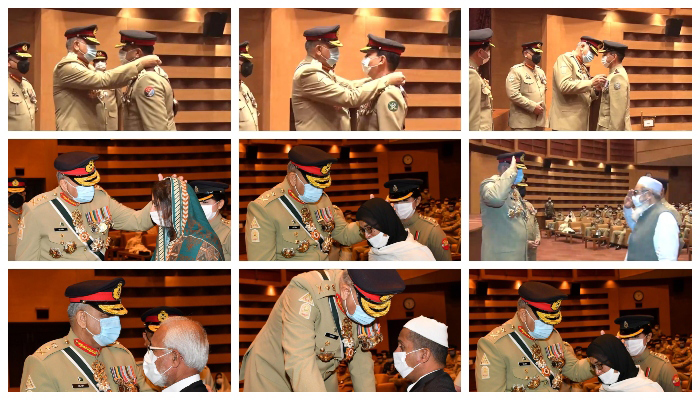 Chief of Army Staff (COAS) General Qamar Javed Bajwa confers awards on military personnel and hands over awards of martyred soldiers to their families at the GHQ in Rawalpindi, on May 18, 2022. — ISPR