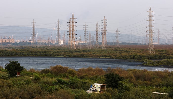 A general view of electricity pylons in Mumbai, India, October 13, 2021. — Reuters