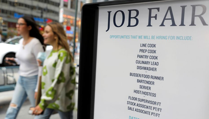 Signage for a job fair is seen on 5th Avenue after the release of the jobs report in Manhattan, New York City, US, on September 3, 2021. — Reuters