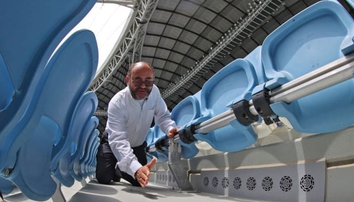 Saud Abdulaziz Abdul Ghani gives a tour of the cooling system at the al-Janoub Stadium on Apr 20, 2022 in Doha, which will host matches of the FIFA football World Cup 2022. Photo: AFP