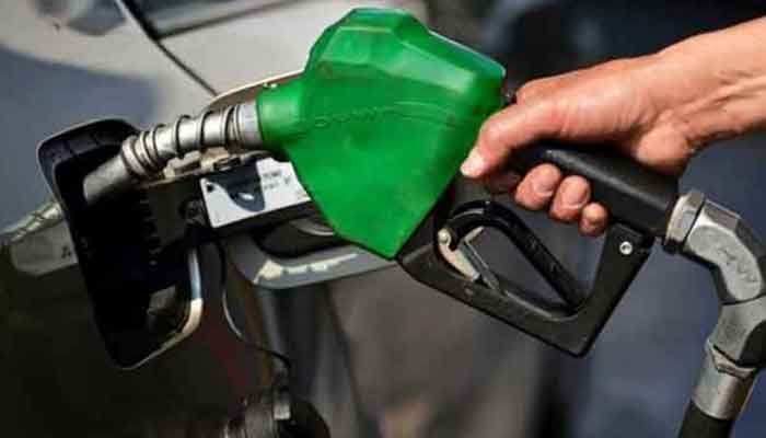 A representational image of a person filling a car tank at the petrol pump. — AFP/File