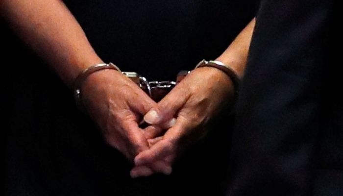 Former Trump campaign chairman Paul Manaforts hands are shown in handcuffs as he is escorted into court during before his arraignment in New York Supreme Court in New York, U.S., June 27, 2019.—Reuters